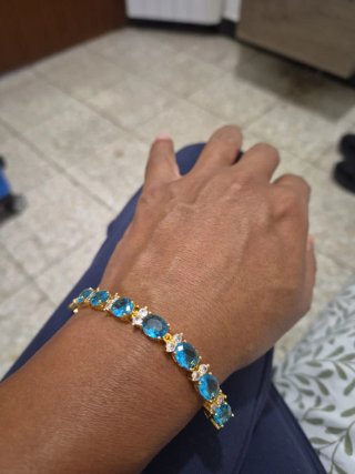 Pulsera acero enchapado en oro con circonita azule