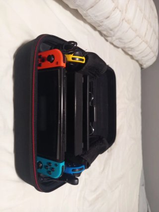 Nintendo Switch con Funda i 4 mandos
