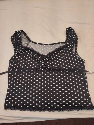 Precioso top negro con estampado clásico de