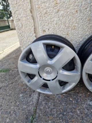 1 Tapacubo Renault kangoo R15