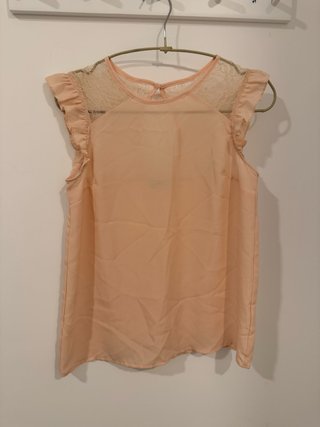 Blusa sin mangas con detalles de encaje