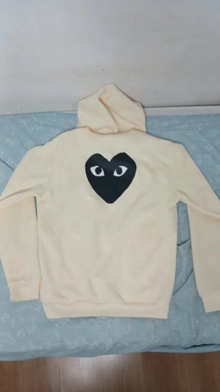 Sudadera Comme des Garçons Amarilla