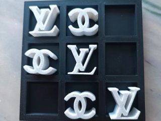Juego 3 en raya LV vs Chanel