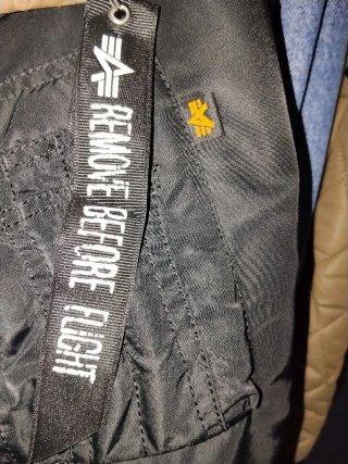 Banda Alpha Industries Remove Before Flight