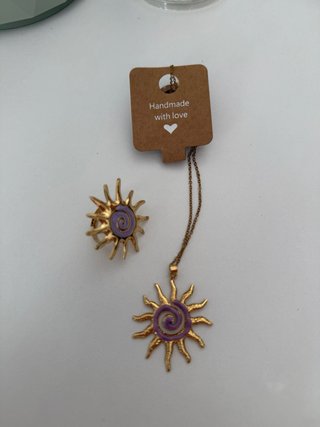 Conjunto de collar y anillo sol