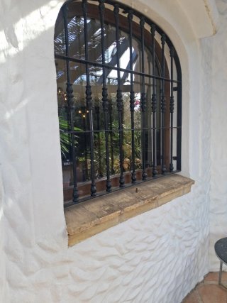 Ventana de PVC con Reja