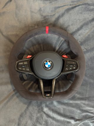 Volante BMW M Sport carbono con airbag y levas