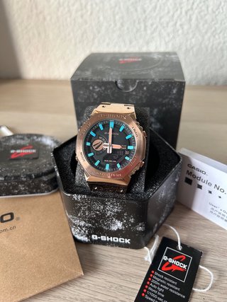 Reloj Casio G-Shox GM-2100 cobre esfera negra-azul