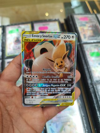 Carta Pokémon Eevee y Snorlax GX 120/181