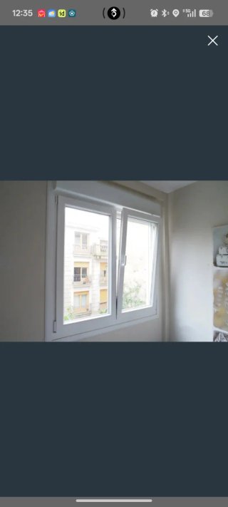 Ventana de PVC blanca oscilobatiente