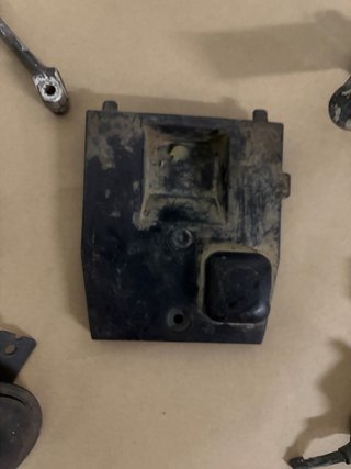 Tapa batería aerox