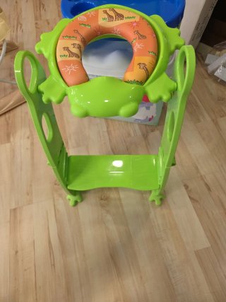 Reductor de baño con escalón