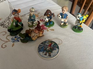 Set di 7 statuine in ceramica