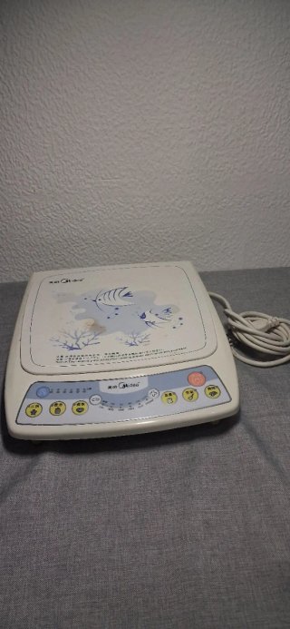 Placa de inducción portátil Midea