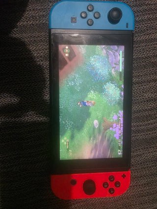 Nintendo Switch con Joy-Con Azul y Rojo