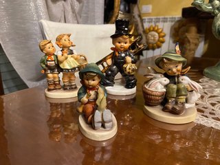Blocco di 4 statuine Hummel