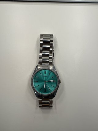 Reloj Casio Plateado con Esfera Turquesa