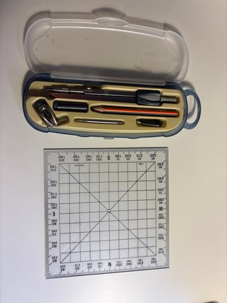 Transportador de rumbos y compás náutico