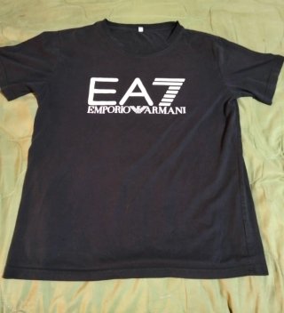 Lote de 9 camisetas de distintas marcas.