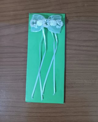Pasador de pelo con lazo y flores