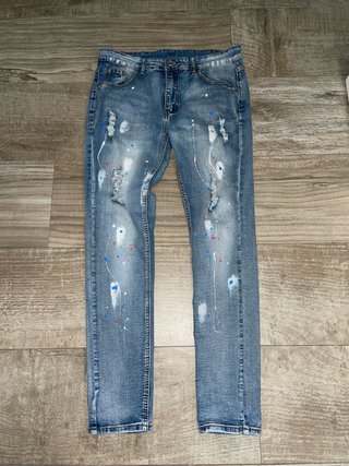Vaqueros Azules con Salpicaduras
