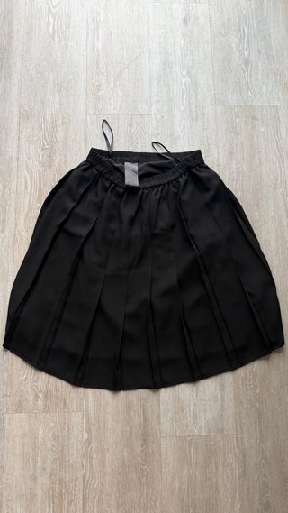 Falda plisada negra Uniqlo