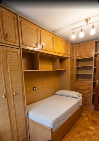 Dormitorio de Puente de Madera
