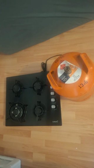 Placa de gas Cata de 4 fuegos con su botano