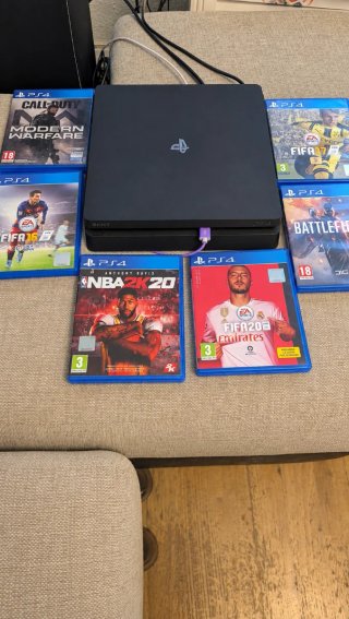 PS4 Slim (PlayStation 4) + 6 Juegos