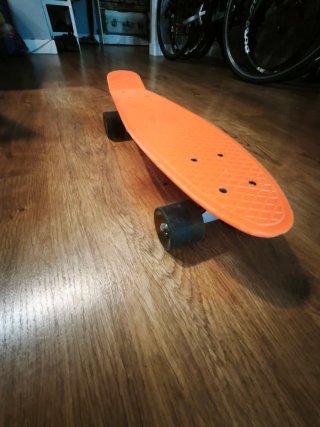 Monopatín tipo Penny Naranja