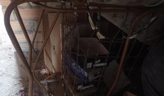 Cama de hierro antigua