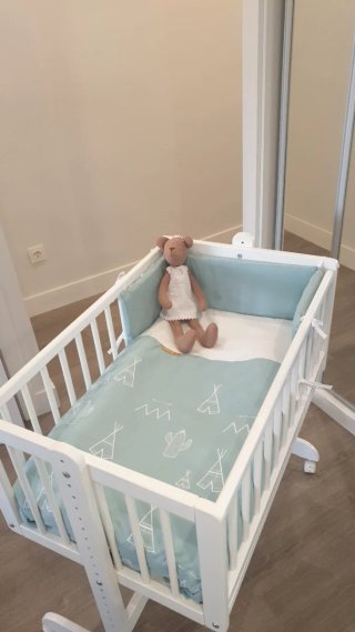 Nórdico y protector para minicuna