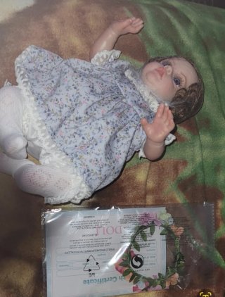 Muñeca de juego de rol con certificado
