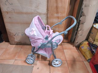 Cochecito para muñecas rosa