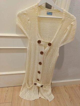 Chaqueta larga de punto beige