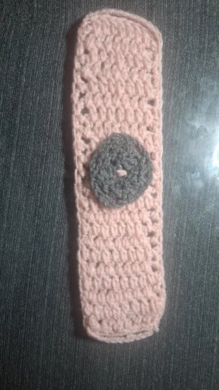 Cubretaza de ganchillo rosa