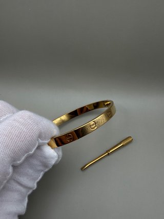 Pulsera rígida dorada