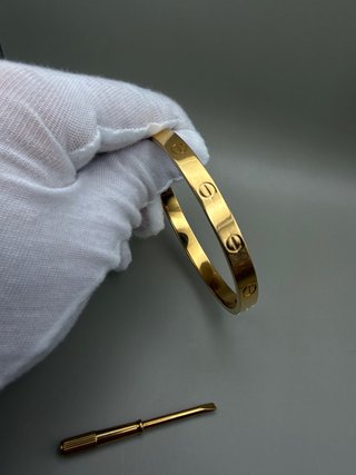 Pulsera rígida dorada