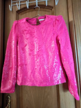 Blusa de lentejuelas rosa