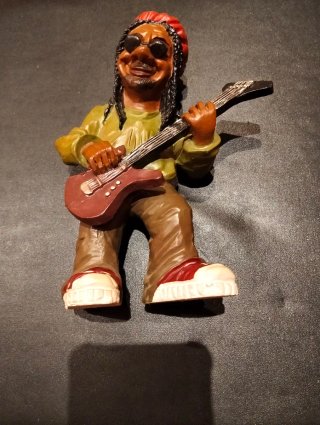 Figura de cerámica de músico