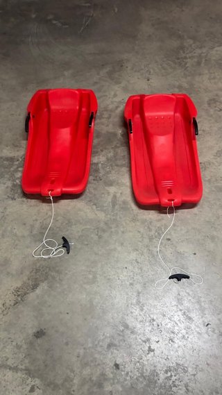 Dos trineos de Nieve Rojo Dechatlon