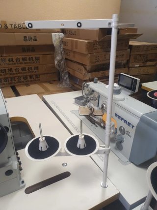 Porta conos para máquina de coser