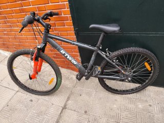 Bicicleta Btwin Negra y Naranja
