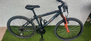 Bicicleta MTB Rockrider 5.2 Junior Negra y Naranja