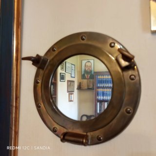 Ojo de buey marino de latón