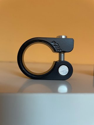 Abrazadera cierre tija 28,6 mm aluminio nueva