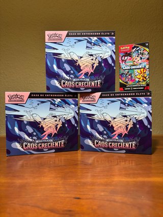 3 Scatole di Allenatore Elite Caos Creciente