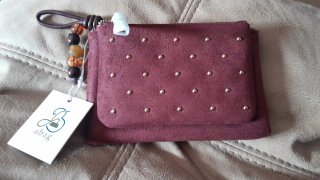 Monedero doble de antelina con tachuelas precio U.