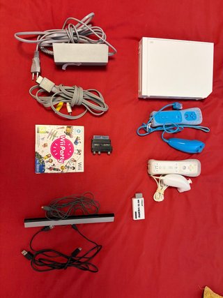 Consola Nintendo Wii con accesorios y juego