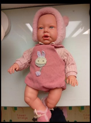 Muñeco Bebé con Conjunto Rosa del corte inglés.